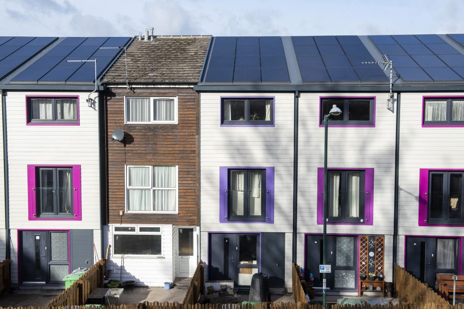 row of modern houses, with solar panels